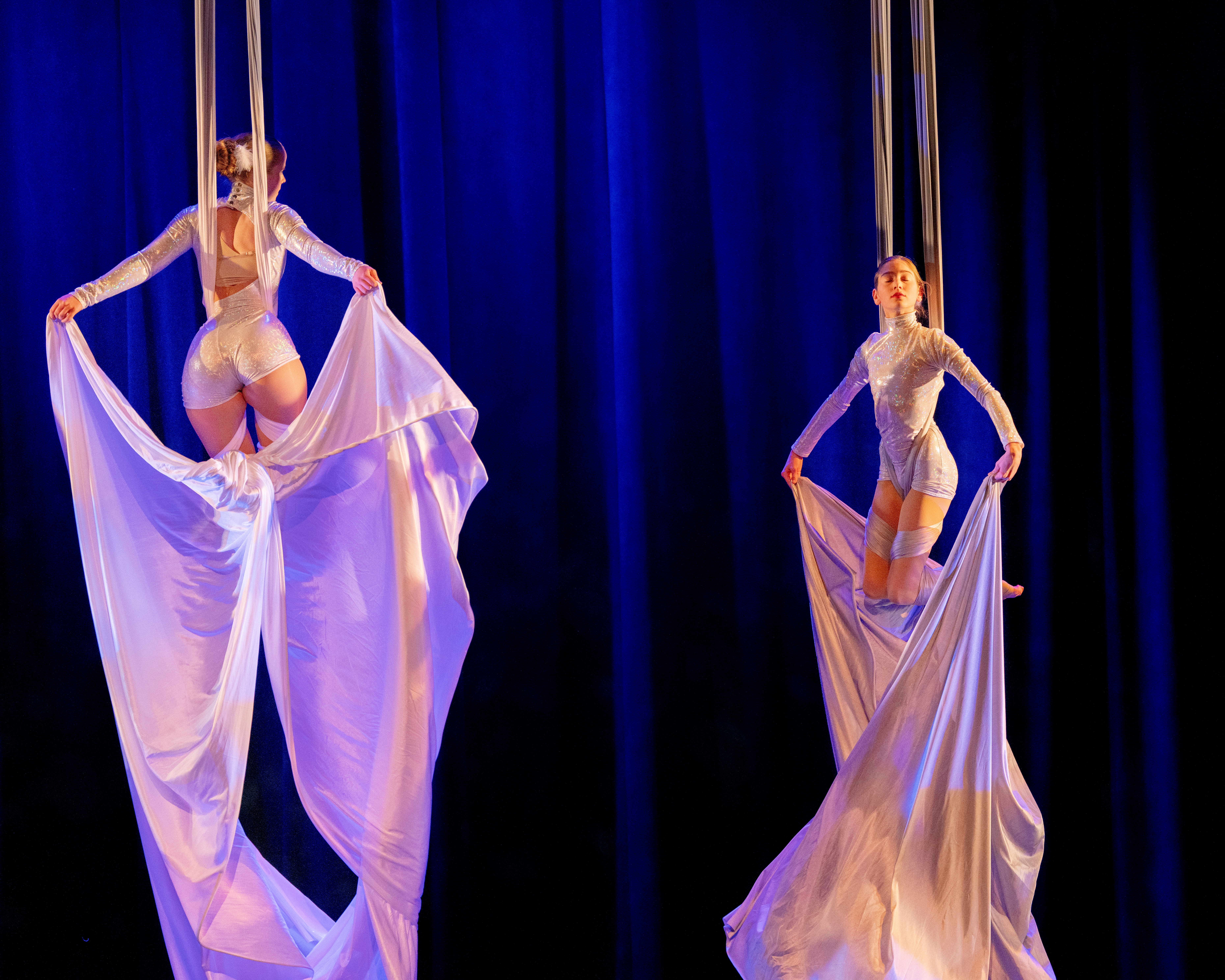 A Nutcracker Angels performers in white costumes
